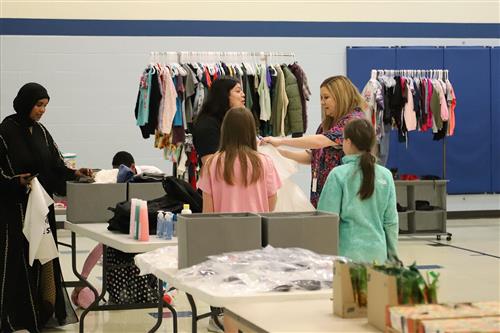 Families shopping at Seedling Style Store